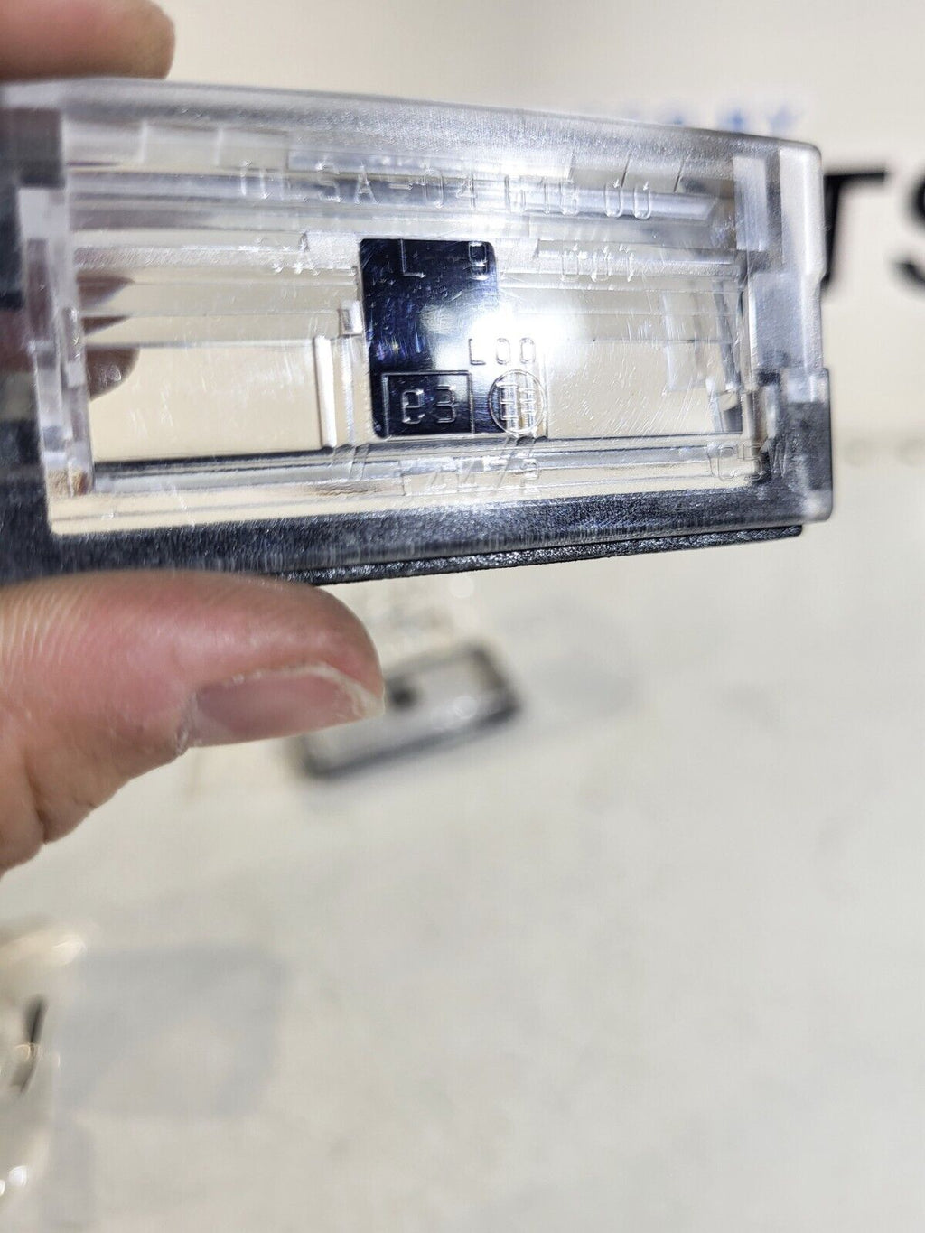 BMW E46 Lens f registration plate illumination 1 pc 51138236269