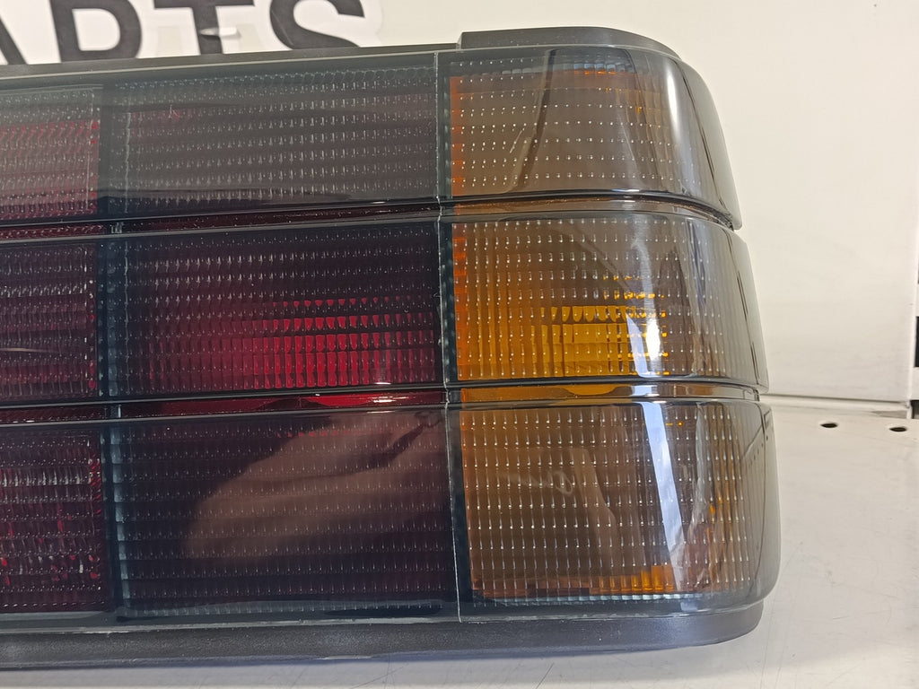 BMW e30 Taillights set dark in the iconic original look from the 80-90s