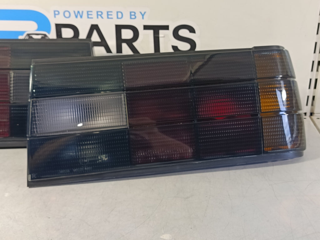 BMW e30 Taillights set dark in the iconic original look from the 80-90s