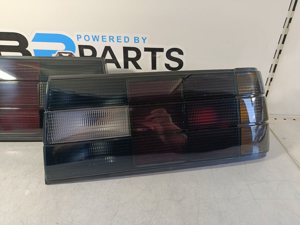 BMW e30 Taillights set dark in the iconic original look from the 80-90s
