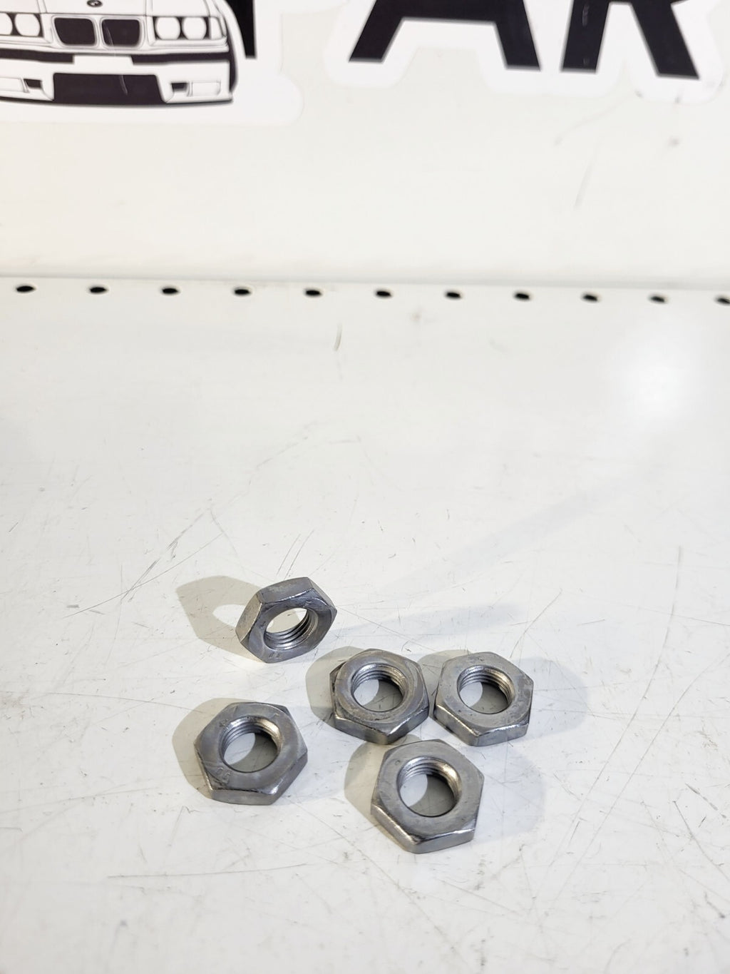 BMW Hex nut M10X1-LH 1psc 07119905857