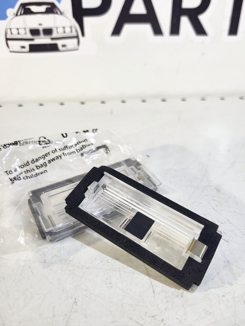 BMW E46 Lens f registration plate illumination 1 pc 51138236269