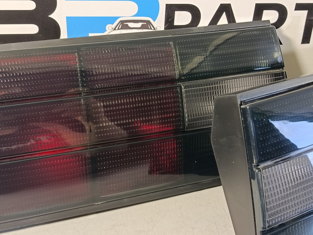 BMW e30 Taillights set dark in the iconic original look from the 80-90s