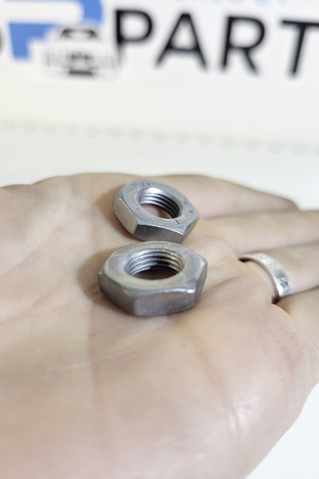 BMW Hex nut M10X1-LH 1psc 07119905857