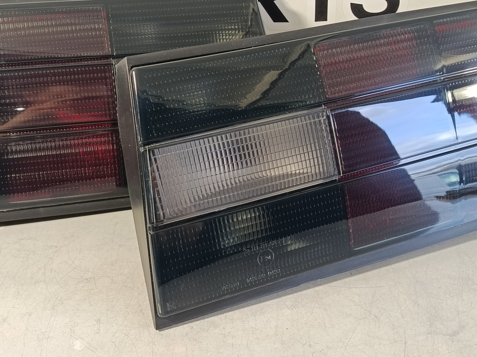 BMW e30 Taillights set dark in the iconic original look from the 80-90s