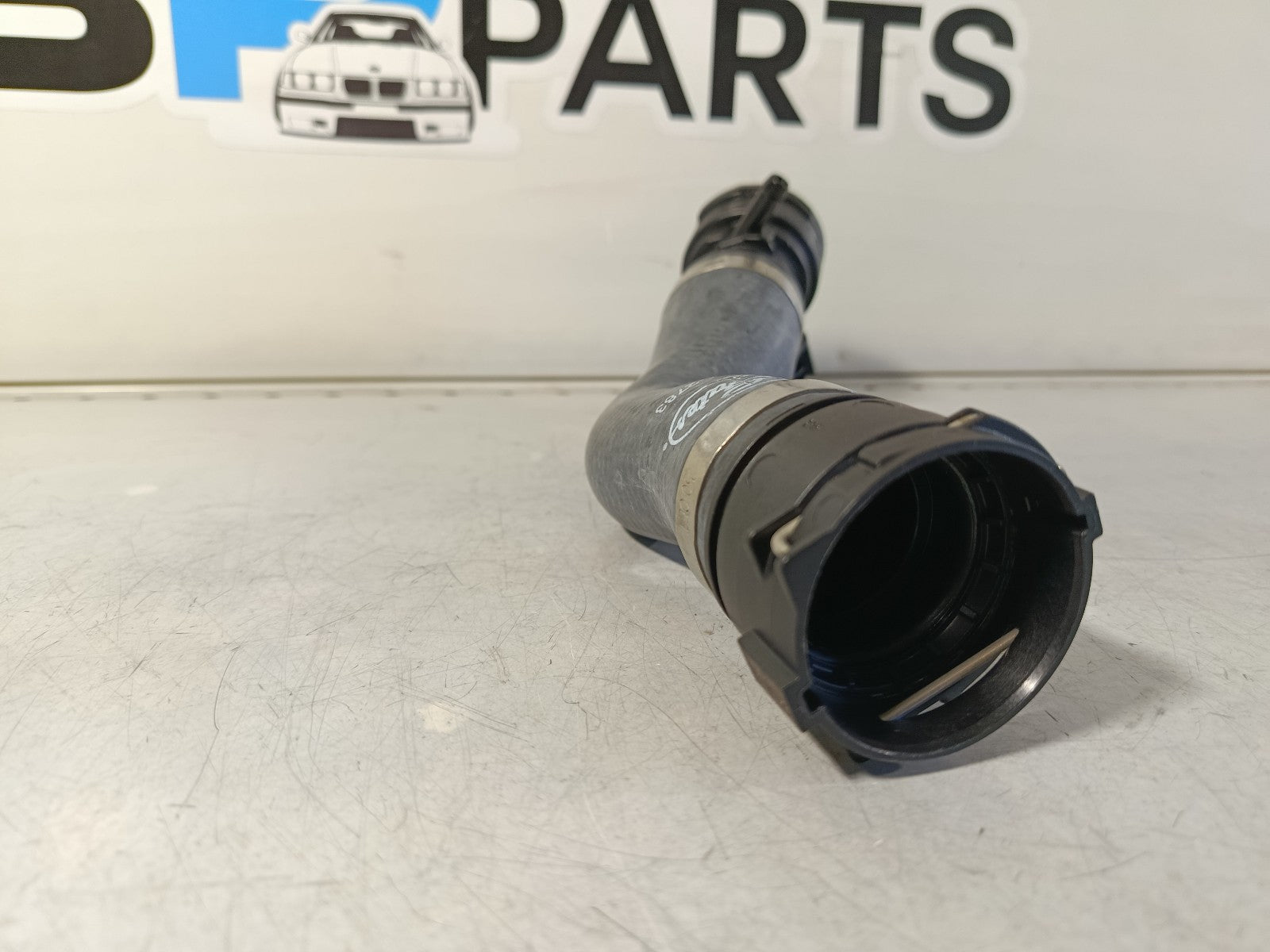BMW e92 325i Hose from engine to radiator, top 17127531579 GATES 05-2783